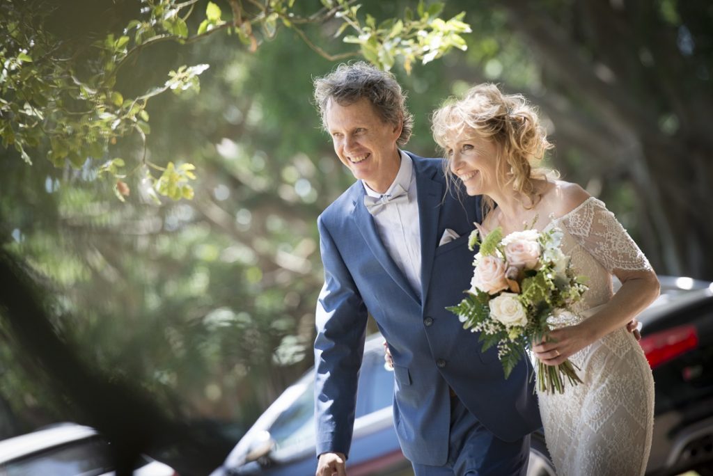 Bride and Groom couple walking and smilinglking